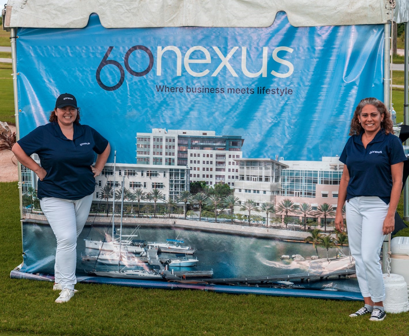 women in front of signage