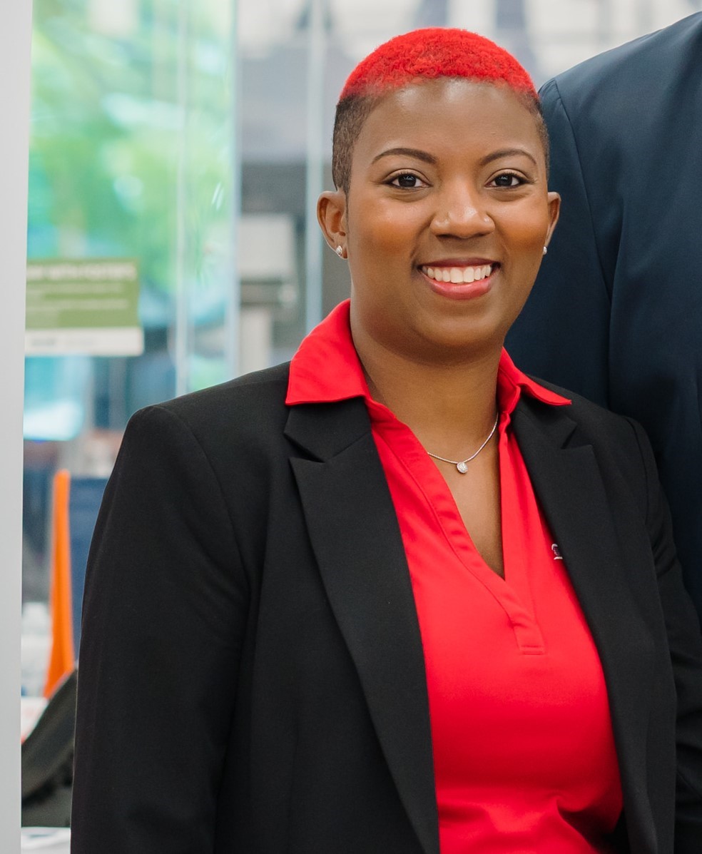 women in business suit with red hair