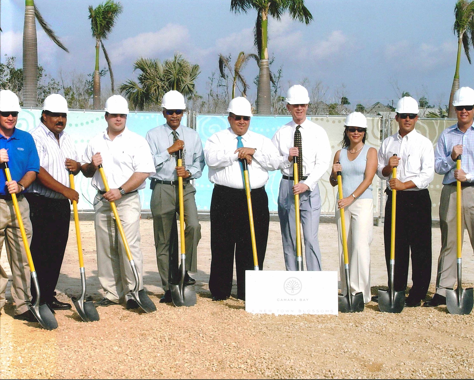 people breaking ground on development site