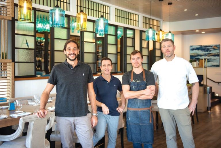 From left: Agua co-owners Cristiano Vincentini and Walter Fajette, award-winning bartender Cory Scruggs and executive chef R. J. Dye
