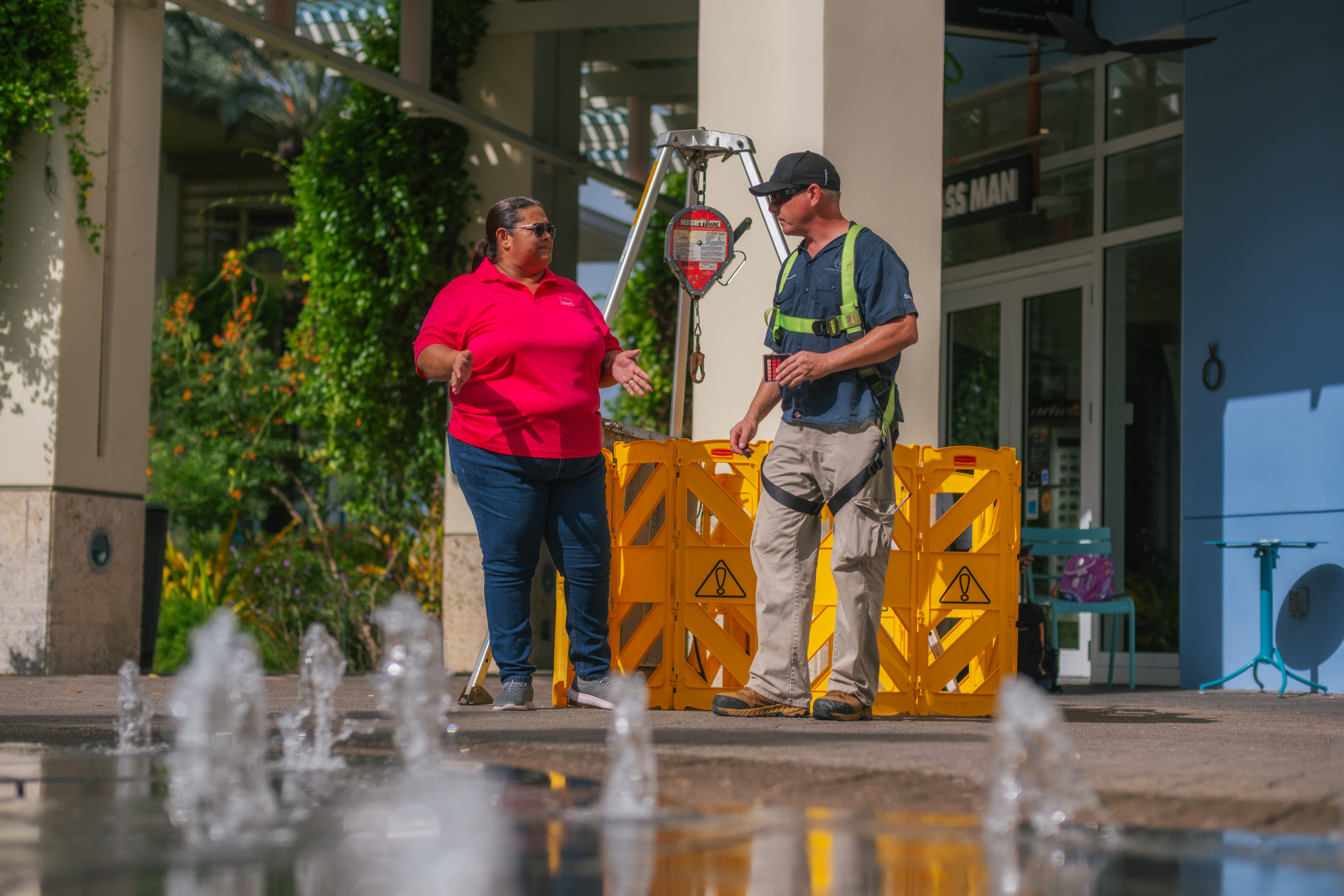 Woman talking to a maintenance person