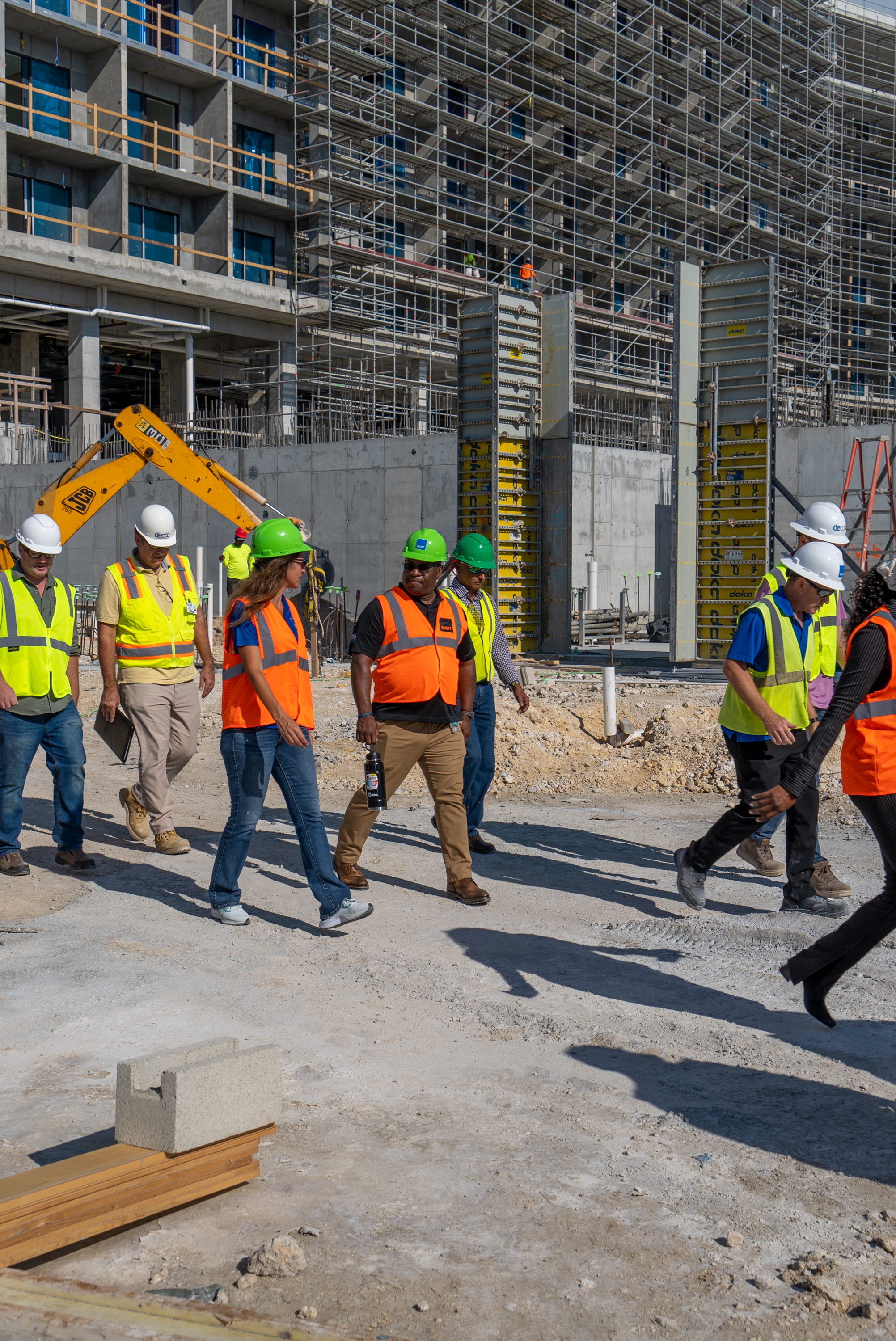 Crew walking through construction site
