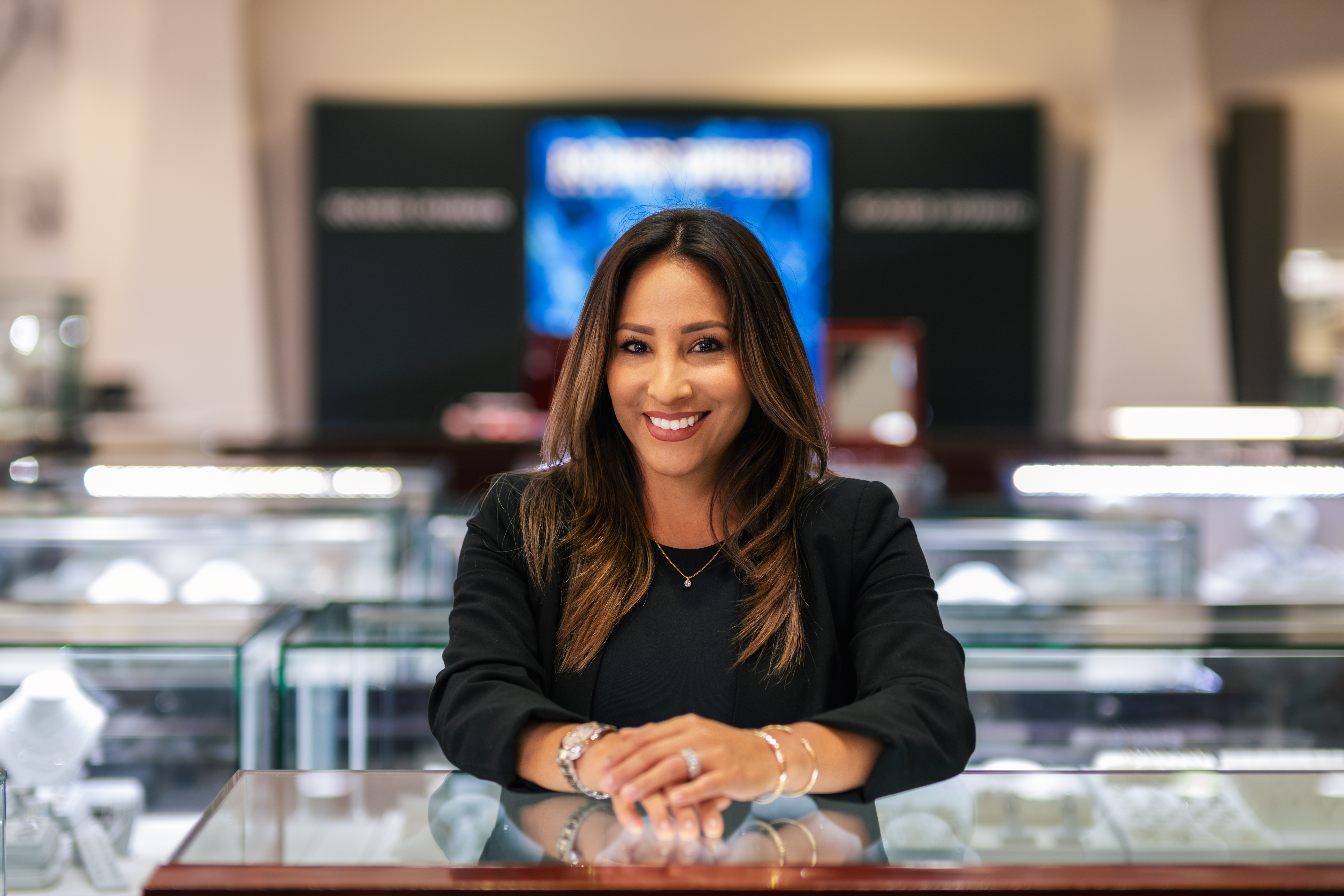 Woman poses in jewellery store