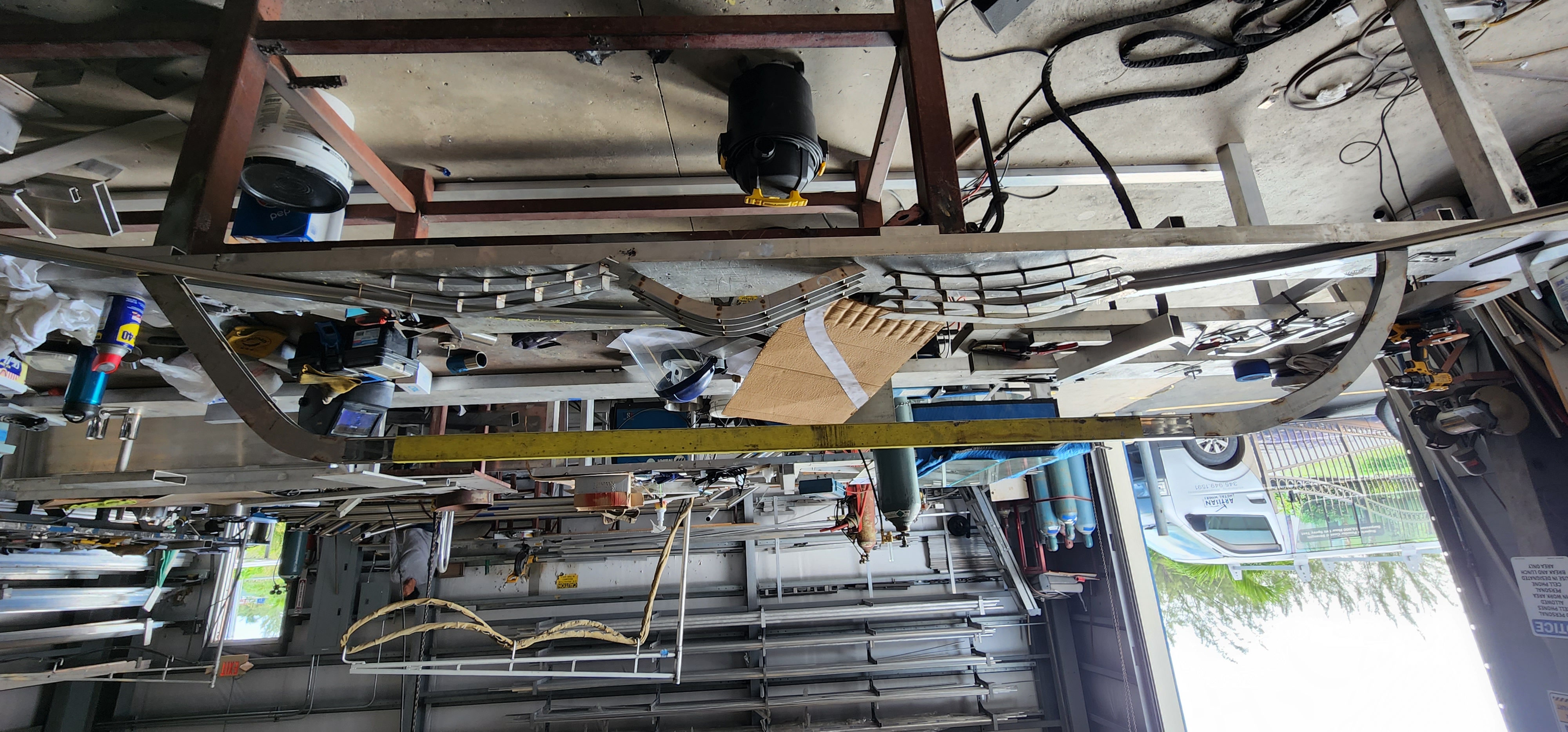 The catboat sculpture in progress in the workshop