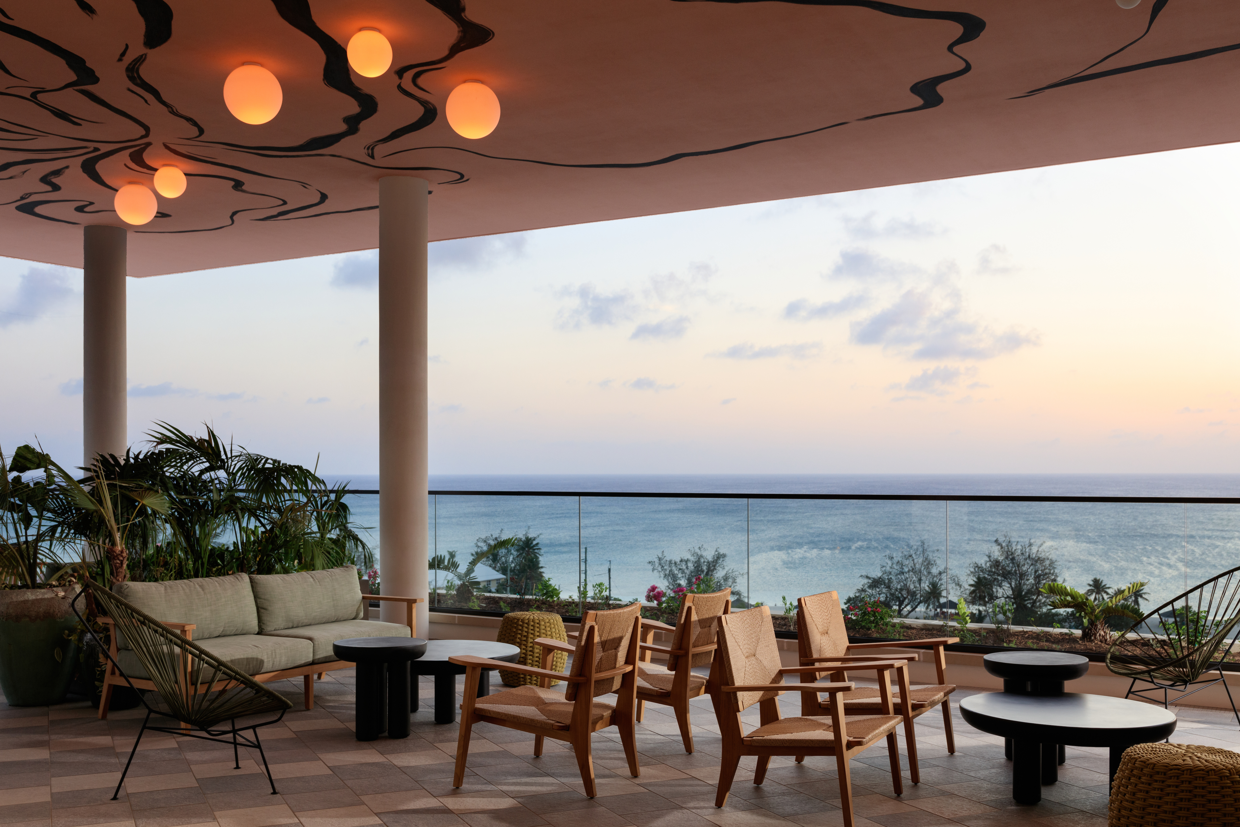 Hotel Indigo® Grand Cayman rooftop terrace overlooking Caribbean Sea